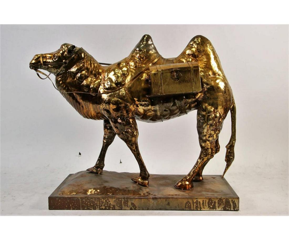 GILT METAL CAMEL FIGURE: GILT METAL CAMEL FIGURE. Height: 17 in. by Width: 18 in. by Depth: 9 in.