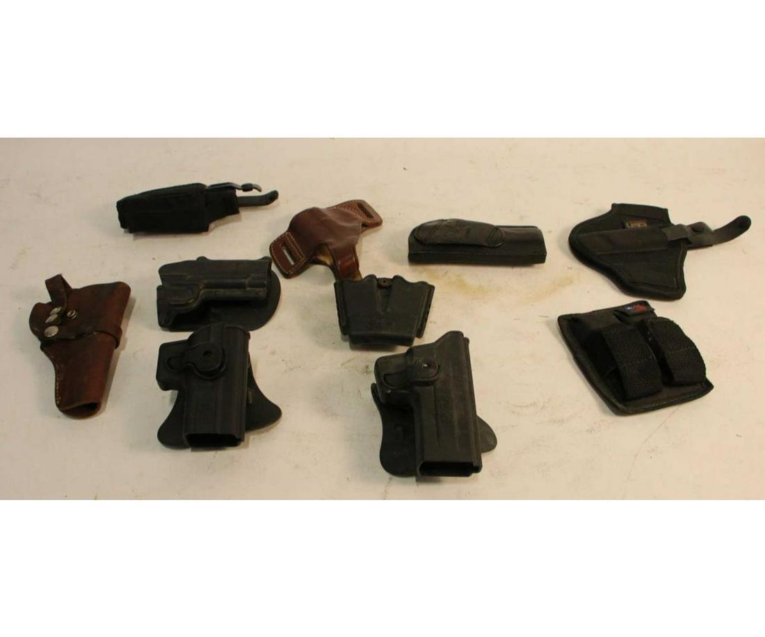 MIXED LOT OF TACTICAL GEAR: MIXED LOT OF TACTICAL GEAR - TACTICAL VEST, TACTICAL BELT WITH VARIOUS POUCHES, AMMO POUCHES, (5) NYLON SLINGS
