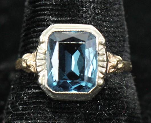 BLUE ZIRCON STONE BEZEL SET IN A 10kt GOLD RING (1 of 2)