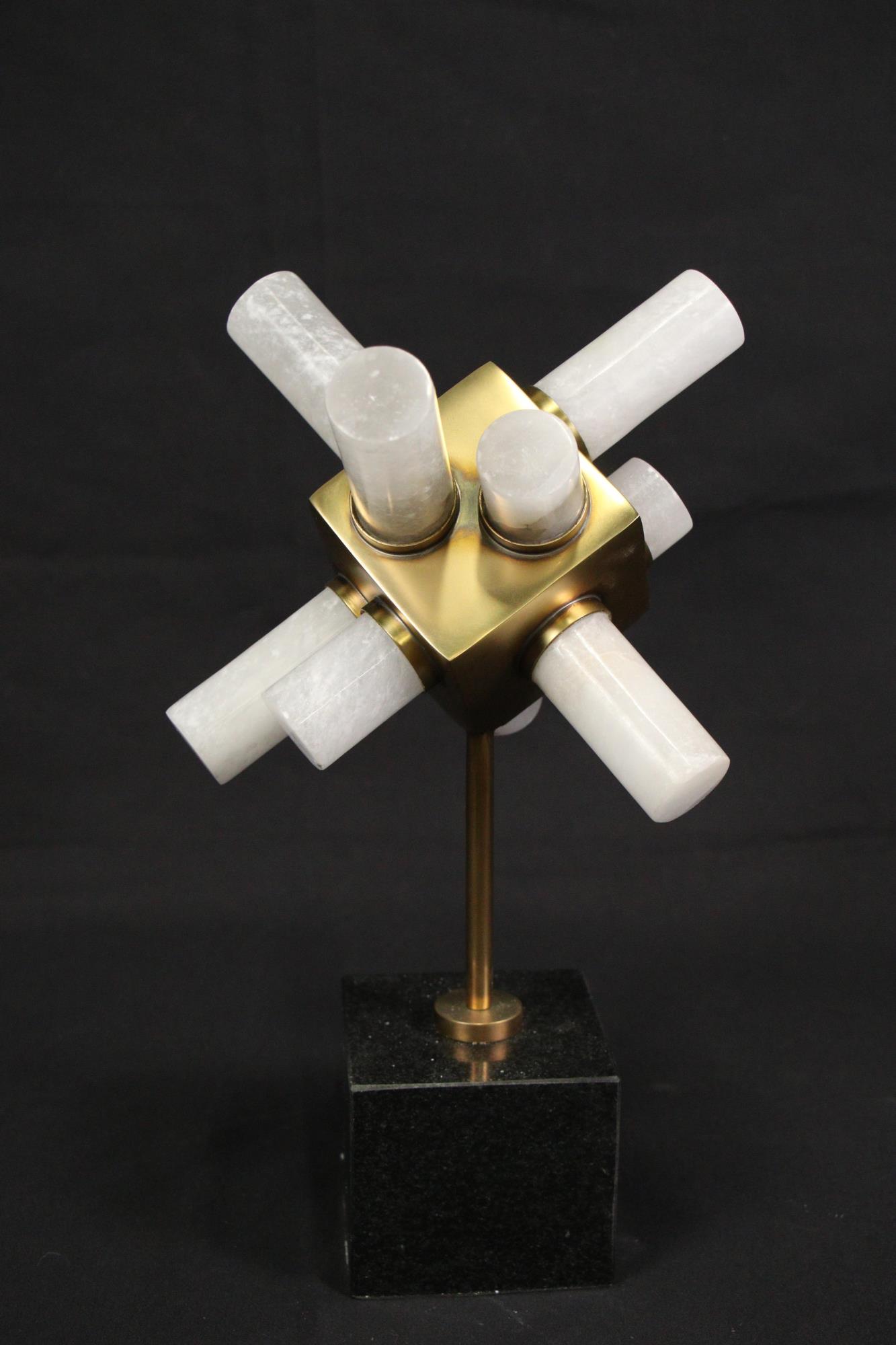 ALABASTER & BRASS CYLINDERS ON BLACK MARBLE BASE: ALABASTER & BRASS CYLINDERS ON BLACK MARBLE BASE. Height: 13 in. by Width: 9 in. by Depth: 5 in.