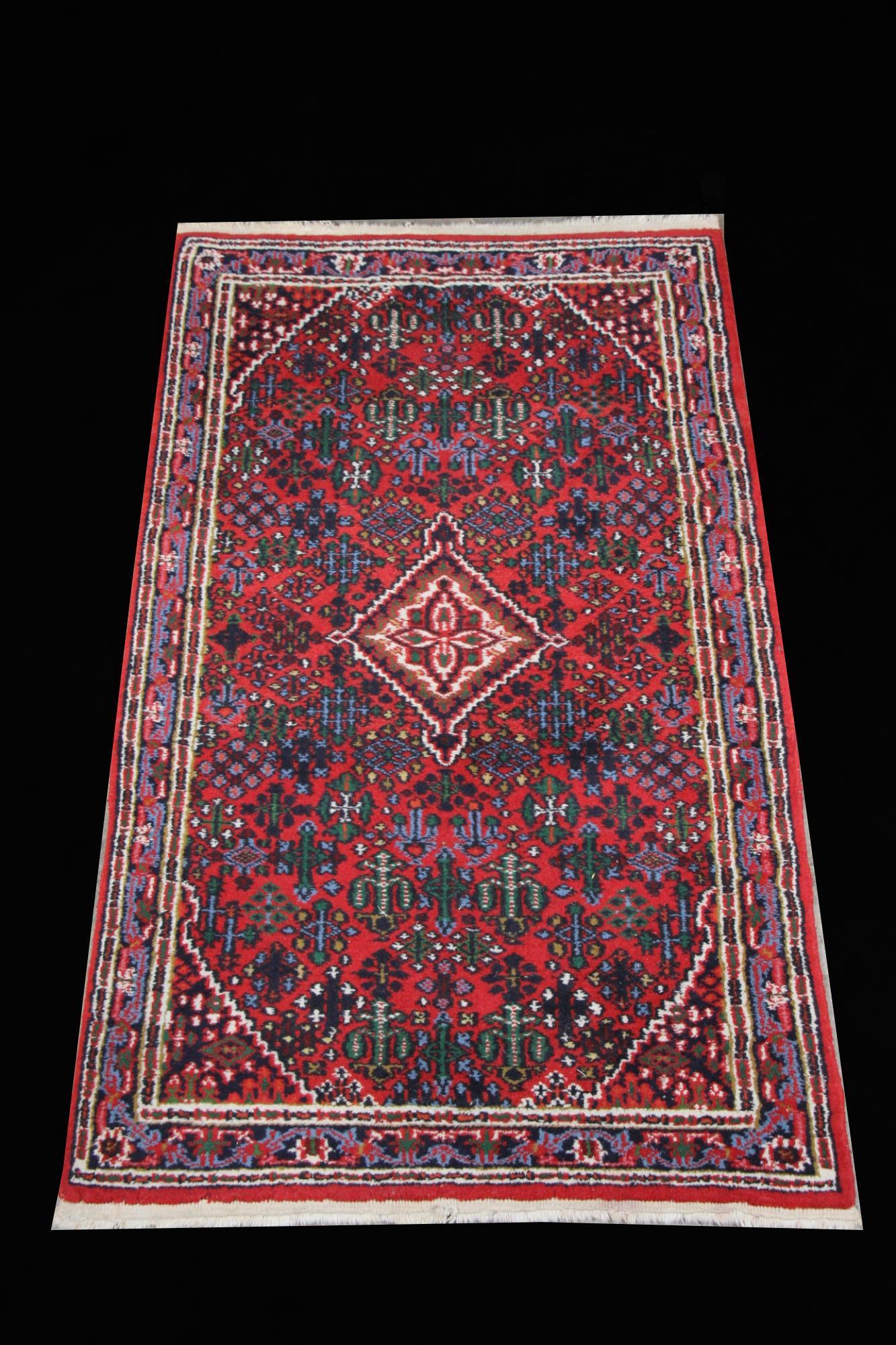 ANTIQUE PERSIAN RUG: ANTIQUE PERSIAN RUG. Height: 5 ft. 5 in. by Width: 3 ft. 0 in.