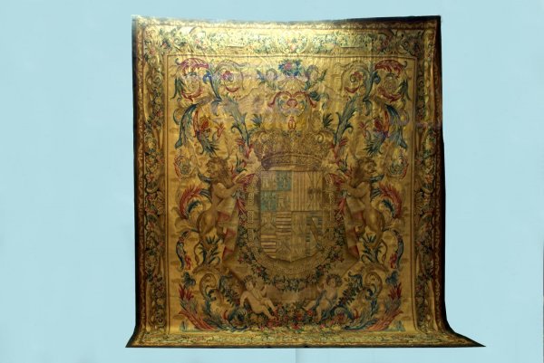 MONUMENTAL HAND MADE AUBUSSON STYLE TAPESTRY: A VERY FINE MONUMENTAL HAND MADE AUBUSSON STYLE TAPESTRY DEPICTING CHERUBS, LIONS AROUND A FAMILY CREST. Height: 132 in. by Width: 148 in.