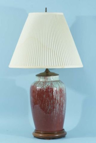 ANTIQUE OX BLOOD VASE CONVERTED INTO LAMP: ANTIQUE SANG-DE-BOEUF (OX BLOOD) VASE CONVERTED INTO LAMP. Height: 31 in. by Width: 9 in. by Depth: 9 in.