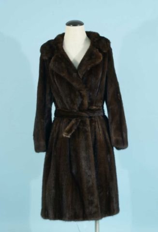 RANCH MINK COAT WITH BELT BY RALPH RUPLEY: RANCH MINK FULL LENGTH COAT WITH RANCH MINK BELT BY RALPH RUPLEY, HOUSTON. Approximate size 8-10.
