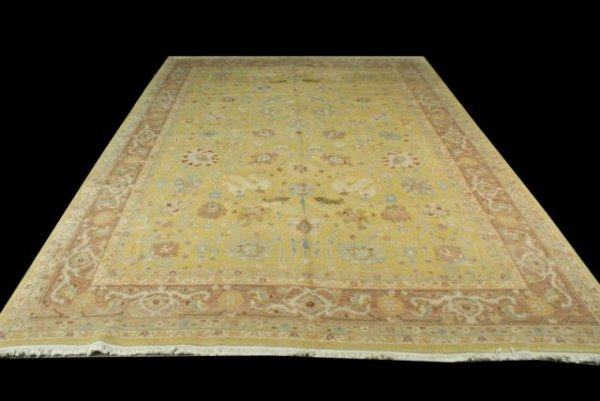 HANDKNOTTED 100% WOOL NEPALESE RUG: HANDKNOTTED 100% WOOL NEPALESE RUG IN MAROON WITH AN OLIVE BACKROUND. Height: 12 ft. 0 in. by Width: 9 ft. 0 in.