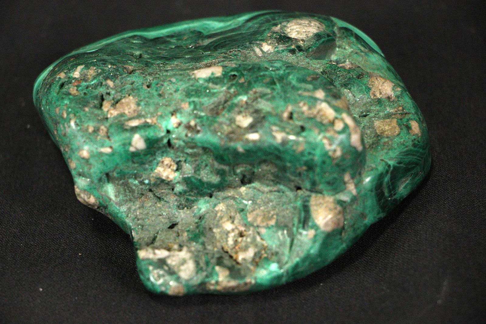 MALACHITE SPECIMEN: MALACHITE SPECIMEN - (ML60) 1.4 LB Height: 1.25 in. by Width: 3.5 in. by Depth: 3