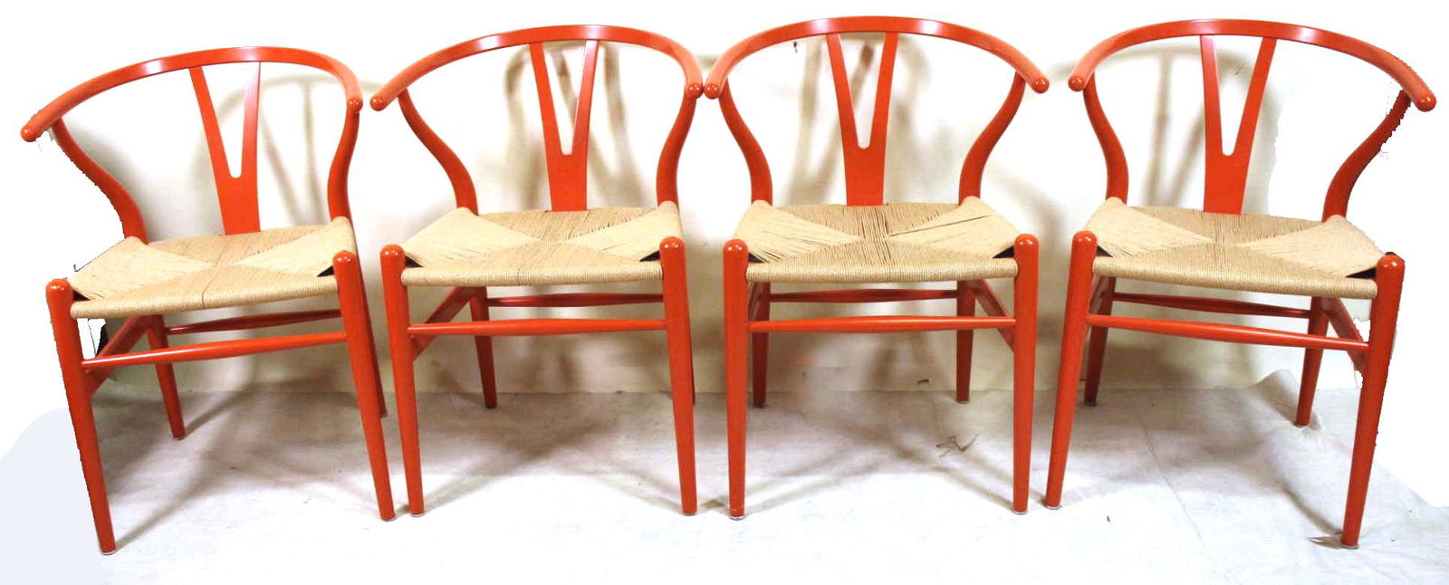 SET OF FOUR CARL HANSEN WISHBONE CHAIRS: SET OF FOUR CARL HANSEN & SON WISHBONE CHAIRS S/N 115340 Height: 30 in. by Width: 19 in. by Depth: 16 in.