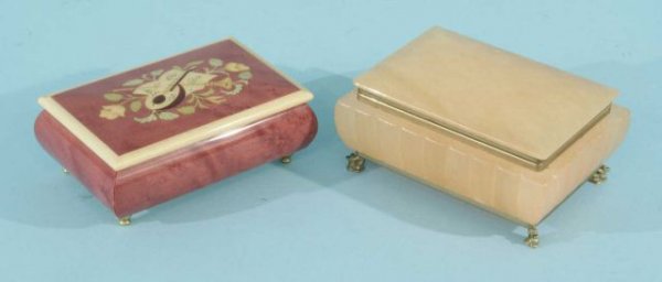 TWO DECORATIVE BOXES: TWO DECORATIVE BOXES. ONE PLAYS MUSIC. Height: 2 3/4 and 2 1/4 in. by Width: 6 and 6 in. by Depth: 4 1/2 and 3 3/4 in.