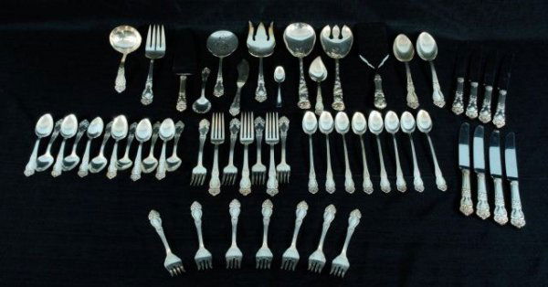 BOX LOT OF 57-PIECES OF REED AND BARTON FLATWARE: BOX LOT OF 57-PIECES OF REED AND BARTON FLATWARE. 7 SALAD FORKS, 8 DINNER FORKS, 8 TEASPOONS, 8 DINNER KNIVES, 12 TEA SPOONS, 2 TABLESPOONS, 7 ASSORTED SERVING UTENSILS, 1 LADLE, 4 SMALL ASSORTED SERV