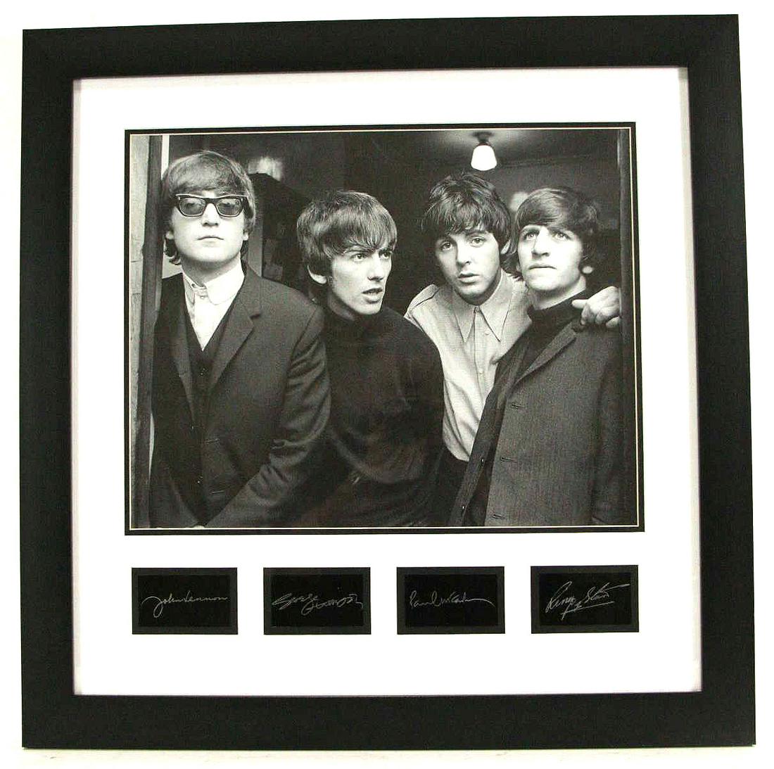 FRAMED PHOTOGRAPH OF THE BEATLES: FRAMED PHOTOGRAPH OF THE BEATLES. SIGNATURE IN PLATE. Height: 27.5 in. by Width: 27.5 in.