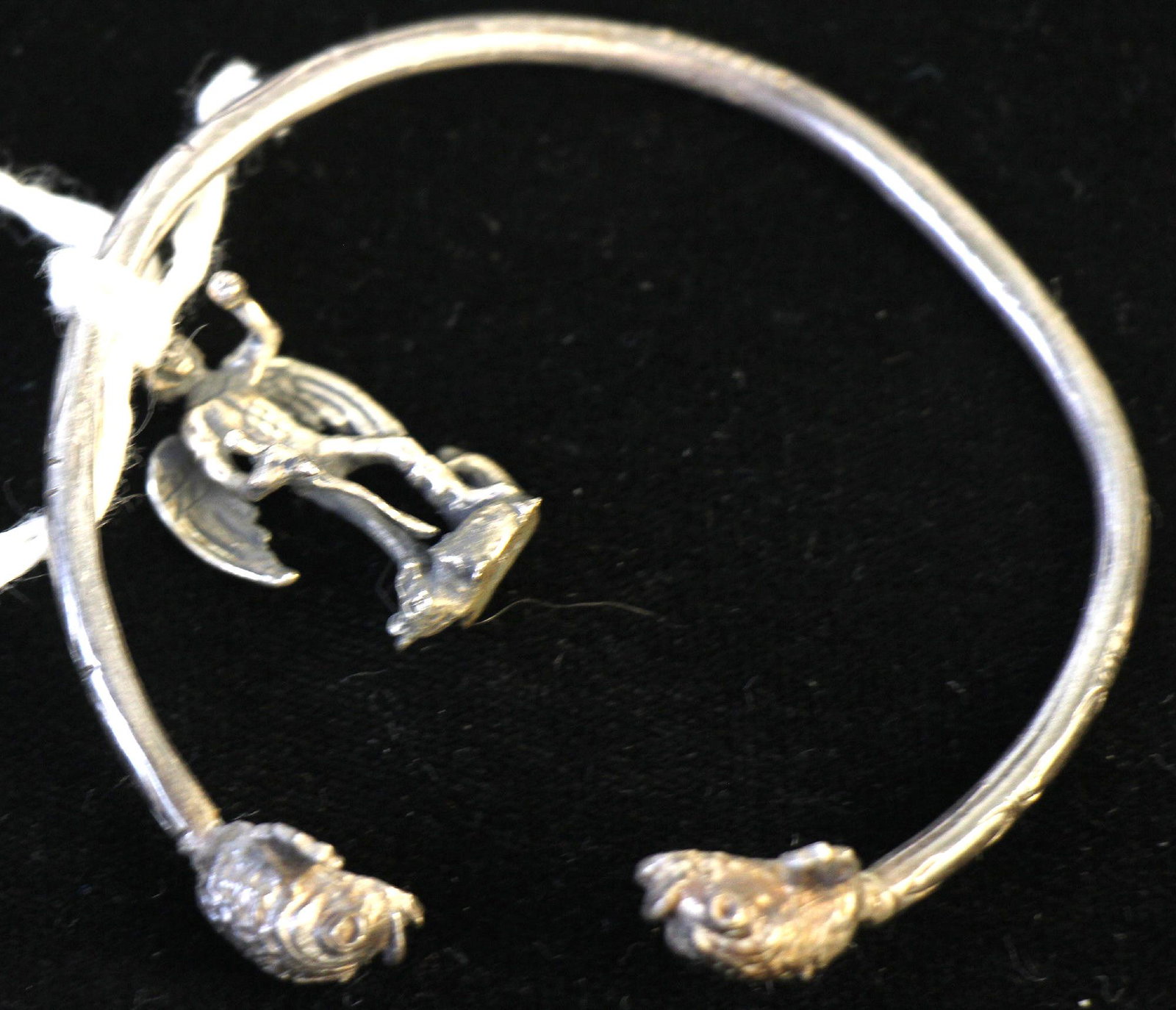 STERLING SILVER BRACELET WITH ANGEL CHARM: STERLING SILVER BRACELET WITH ANGEL CHARM.