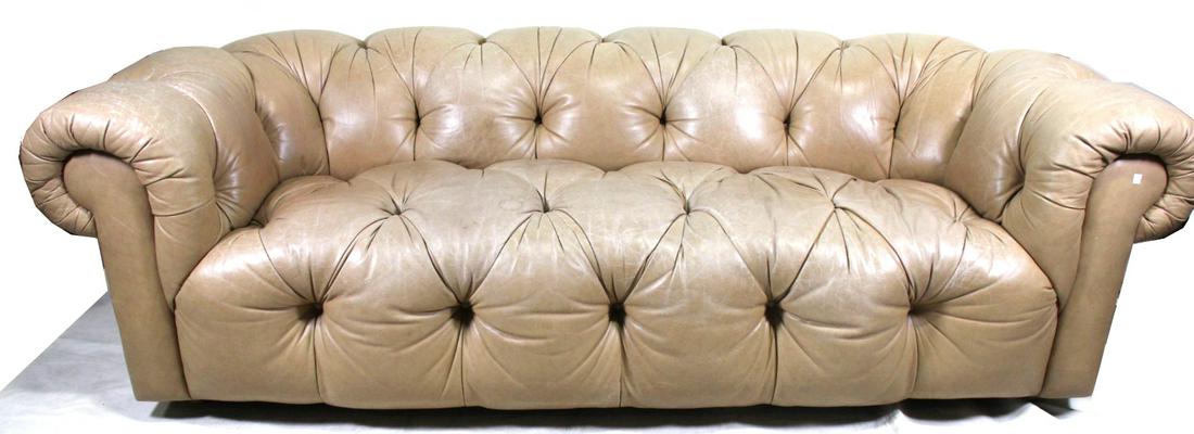 TAN BUTTON TUFTED LEATHER SOFA: TAN BUTTON TUFTED LEATHER SOFA. Height: 28 in. by Width: 96 in. by Depth: 38
