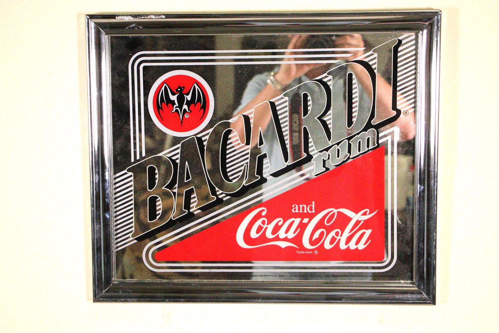 BACARDI RUM AND COCA-COLA MIRRORED SIGN: BACARDI RUM AND COCA-COLA MIRRORED SIGN Height: 16 in. by Width: 19 in.