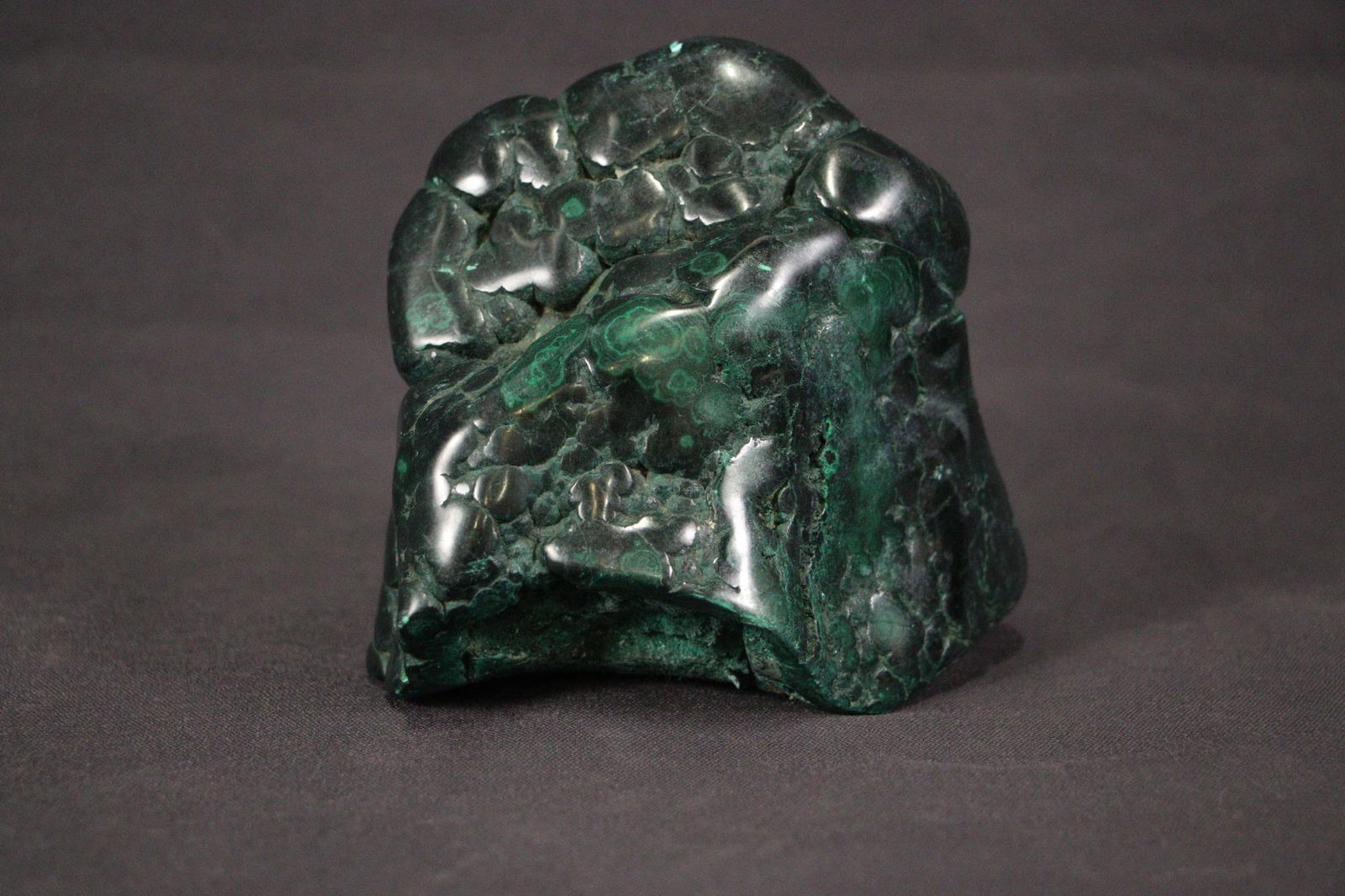 POLISHED BULLSEYE MALACHITE SPECIMEN: POLISHED BULLSEYE MALACHITE SPECIMEN - (ML69) 2.6 LBS. Height: 5 in. by Width: 5 in. by Depth: 3 in.