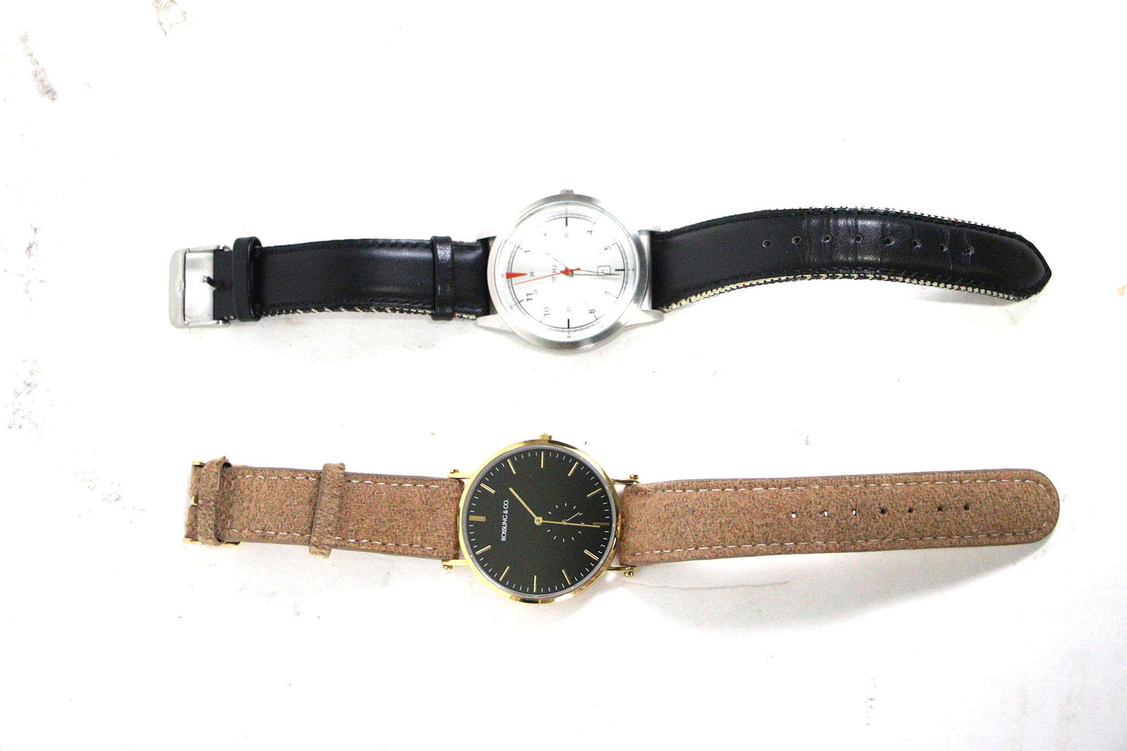 PAIR OF MENS QUARTZ DRESS WRIST WATCHES: PAIR OF MENS DRESS WRIST WATCHES:1. MENS ELLIOT HAVOK OXFORD STAINLESS STEEL QUARTZ DRESS WATCH - NEW BATTERY/WORKS GREAT2. MENS ROSSLING & CO. BLACK DIAL LEATHER BAND DRESS WATCH - NEW BATTERY/WORKS 