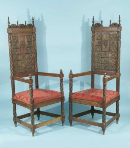 ANTIQUE PAIR OF GOTHIC REVIVAL CARVED ARMCHAIRS: ANTIQUE PAIR OF GOTHIC REVIVAL WOOD CARVED ARMCHAIRS IN RED DAMASK UPHOLSTERY. Height: 63 in. by Width: 24 in. by Depth: 21 1/2 in.