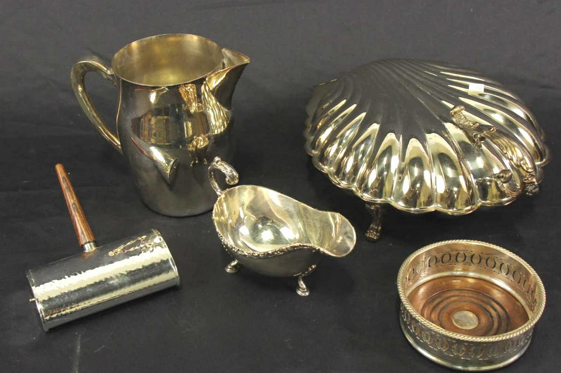 MIXED LOT OF FIVE SILVER PLATED SERVING PIECES: MIXED LOT OF FIVE SILVER PLATED SERVING PIECES. PITCHER, CREAMER, SHELL COVERED DISH, SILENT BUTLER CRUMB CATCHER, WINE COASTER.