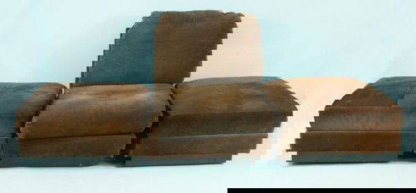 THREE-PIECE SECTIONAL IN BROWN SUEDE UPHOLSTERY: THREE-PIECE SECTIONAL IN BROWN SUEDE UPHOLSTERY. Height: 32 and 17 in. by Width: 30 and 31 in. by Depth: 42 and 31 in.