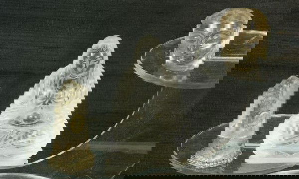 LOT OF THREE ROCK CRYSTAL BUDDHAS: LOT OF THREE ROCK CRYSTAL BUDDHAS. BUDDHA HEAD, BUDDHA OBELISK WITH BUDDHA INSET, SEATED BUDDHA. Height: 4 3/4 and 2 in. by Width: 3 and 1 1/2 in. by Depth: 1 1/4 and 1 1/2 in.