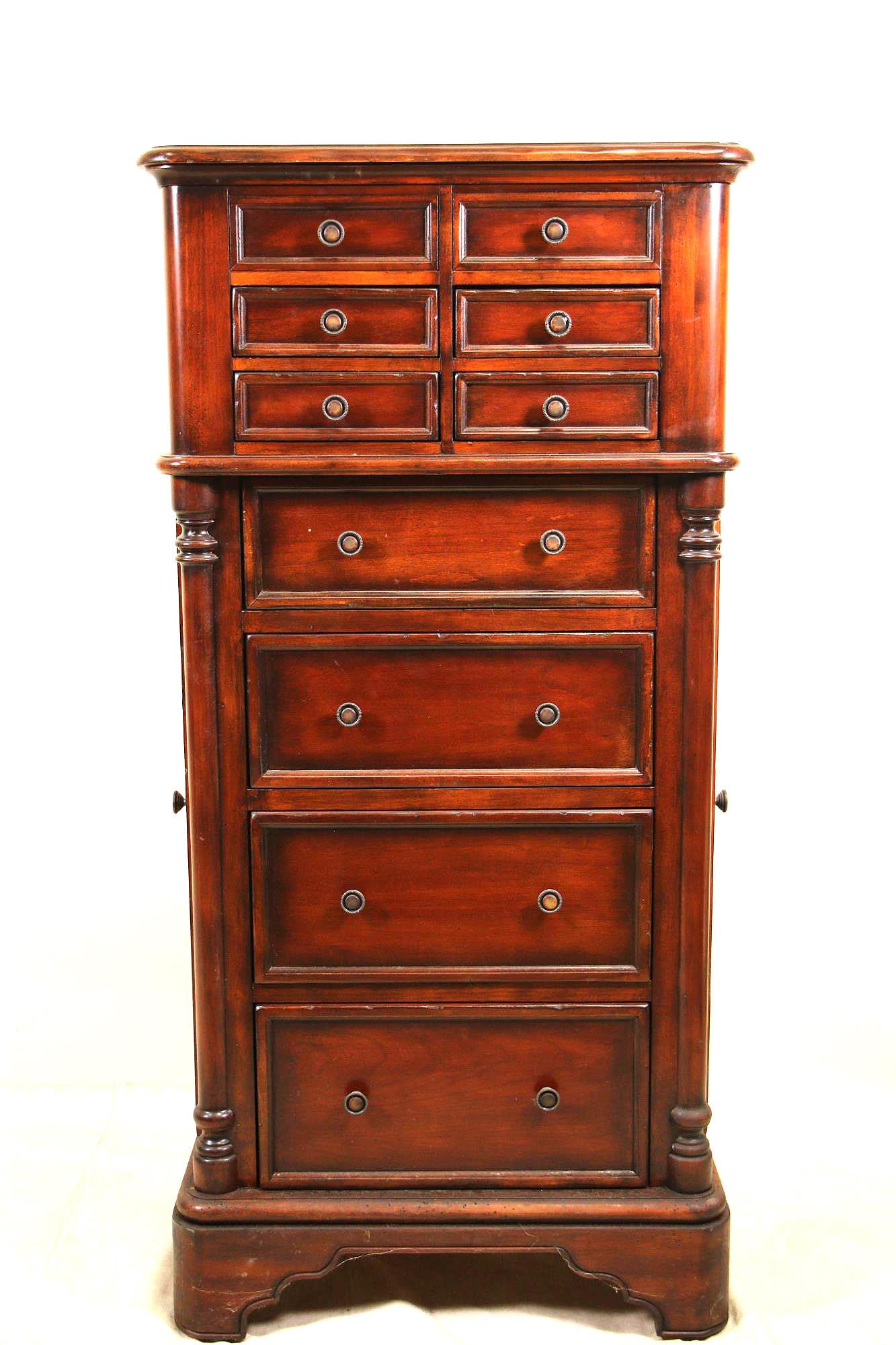 HOOKER FURNITURE SEVEN SEAS JEWELRY CHEST: HOOKER FURNITURE SEVEN SEAS JEWELRY CHEST WITH TOP THAT LIFTS TO REVEAL MIRROR AND RING DRAWER, SIDES OPEN FOR NECKLACE HOLDERS. Height: 50 in. by Width: 24 in. by Depth: 16 in.
