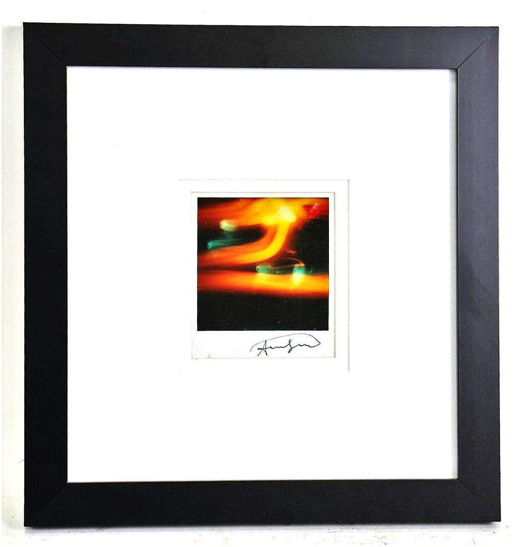 FRAMED POLAROID FROM THE ANDY WARHOL ESTATE: FRAMED POLAROID WITH STAMP FROM THE ANDY WARHOL ESTATE. Height: 12 in. by Width: 11 in.