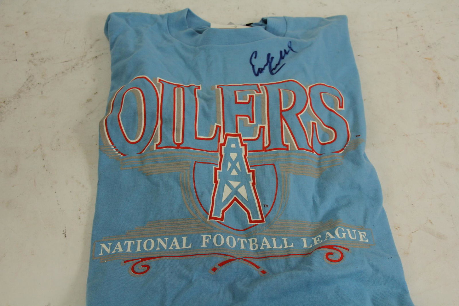 HOUSTON OILERS SHIRT SIGNED BY EARL CAMPBELL: VINTAGE HOUSTON OILERS SHIRT SIGNED BY EARL CAMPBELL.