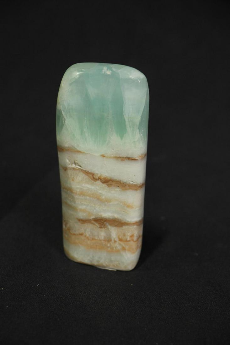 CARIBBEAN CALCITE FREEFORM: CARIBBEAN CALCITE FREEFORM - (CA16) .4 LBS. Height: 4.5 in. by Width: 1.5 in. by Depth: .5 in.