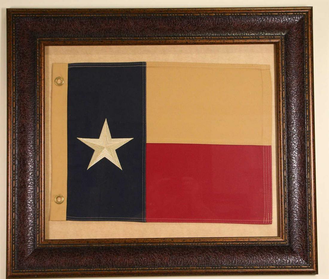 FRAMED STATE OF TEXAS FLAG: FRAMED STATE OF TEXAS FLAG. Height: 27 in. by Width: 31 in.