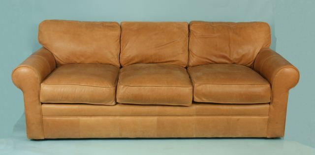 EXPRESSIONS CUSTOM LEATHER SOFA: THREE-CUSHION LEATHER SOFA BY EXPRESSIONS CUSTOM FURNITURE. Height: 36 in. by Width: 88 in. by Depth: 39 in.