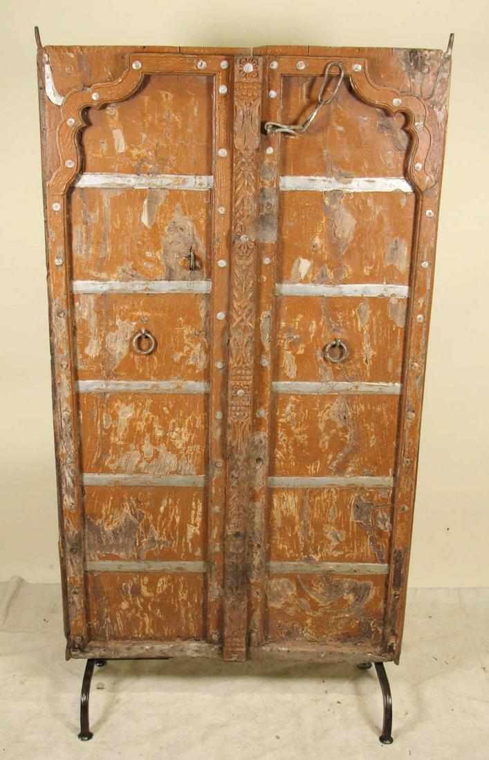 ANTIQUE MOORISH DOOR ON STAND: ANTIQUE MOORISH DOOR ON STAND.