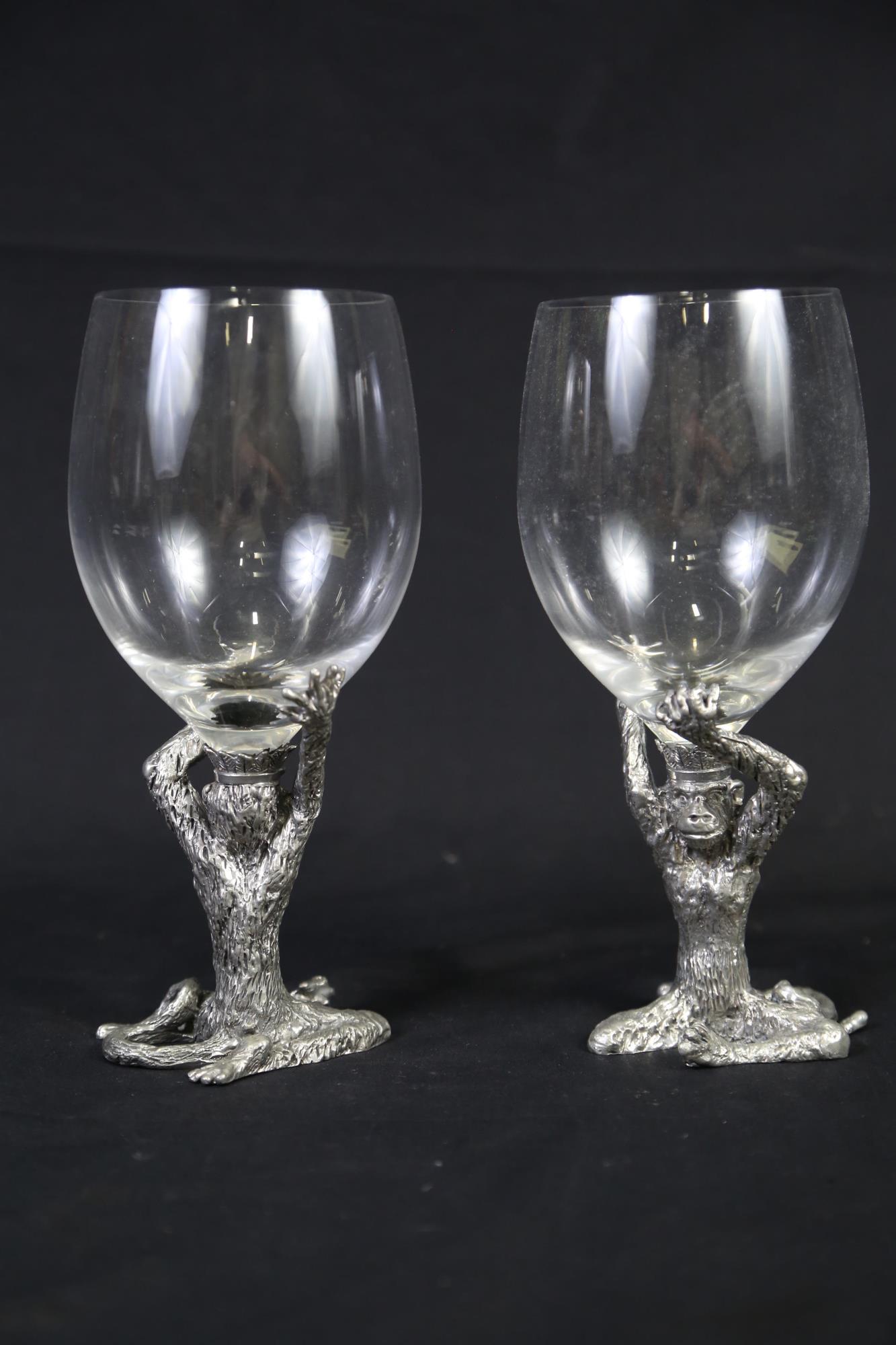 PAIR OF MONKEY KING GLASS CUPS: PAIR OF MONKEY KING GLASS CUPS.