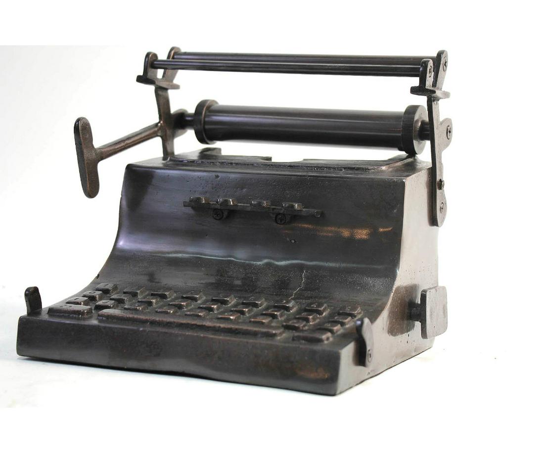 BRONZE TYPEWRITER SCULPTURE: BRONZE TYPEWRITER SCULPTURE.