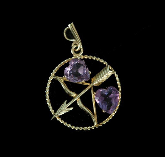 14KT BOW AND ARROW PENDANT WITH 2-8MM HEART SHAPED: 14KT BOW AND ARROW PENDANT WITH 2-8MM HEART SHAPED AMETHYST 4 GRAMS. Height: 1 1/4 in. by Width: 1 1/4