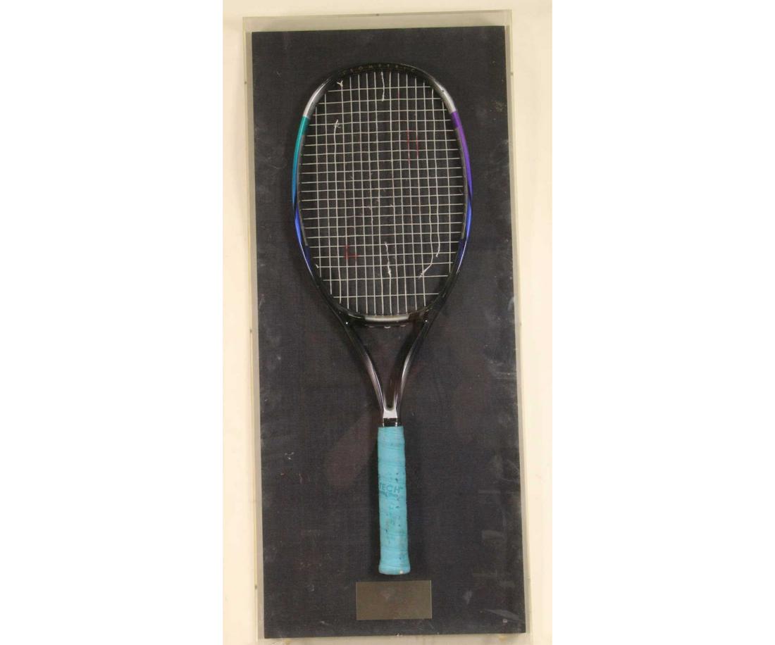 FRAMED MARTINA NAVRATILOVA 1998 US OPEN RACQUET: FRAMED AUTOGRAPHED MARTINA NAVRATILOVA 1998 US OPEN RACQUET Height: 34 in. by Width: 14 in.