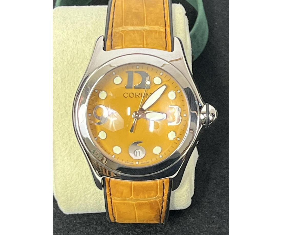 CORUM BUBBLE DATE ORANGE SWISS QUARTZ 45MM WATCH: CORUM BUBBLE DATE SWISS QUARTZ 45MM WATCH - REF 163.250.20, ORANGE DIAL, ORANGE ALLIGATOR LEATHER STRAP WITH DOUBLE FOLD CLASP