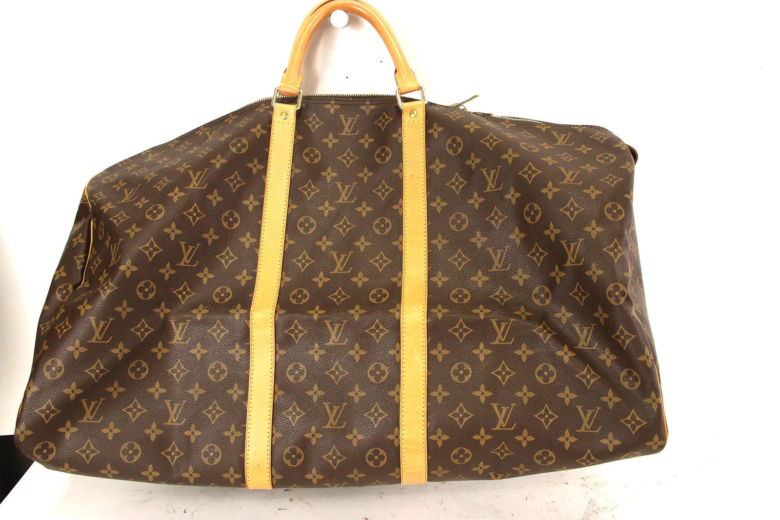 Louis Vuitton Brown Keepall Travel Bag: Louis Vuitton Brown Monogrammed Coated Canvas Keepall Travel Bag - In Excellent Condition (COA Included) Height: 12 in. by Width: 24 in. by Depth: 12 in.