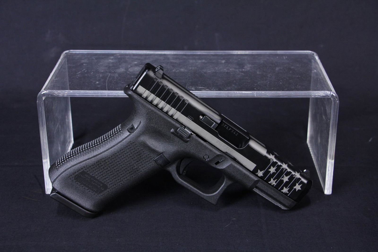 GLOCK 45 APOLLO CUSTOM 9MM PISTOL (NEW): NEW GLOCK 45 APOLLO CUSTOM EDITION 9MM PISTOL - BLACK/SILVER nDLC US FLAG, FLARED MAGWELL, INCLUDES CASE AND TWO MAGAZINES; CALIBER: 9MM; SERIAL: BKLP342; NEW FIREARM; (L2546)