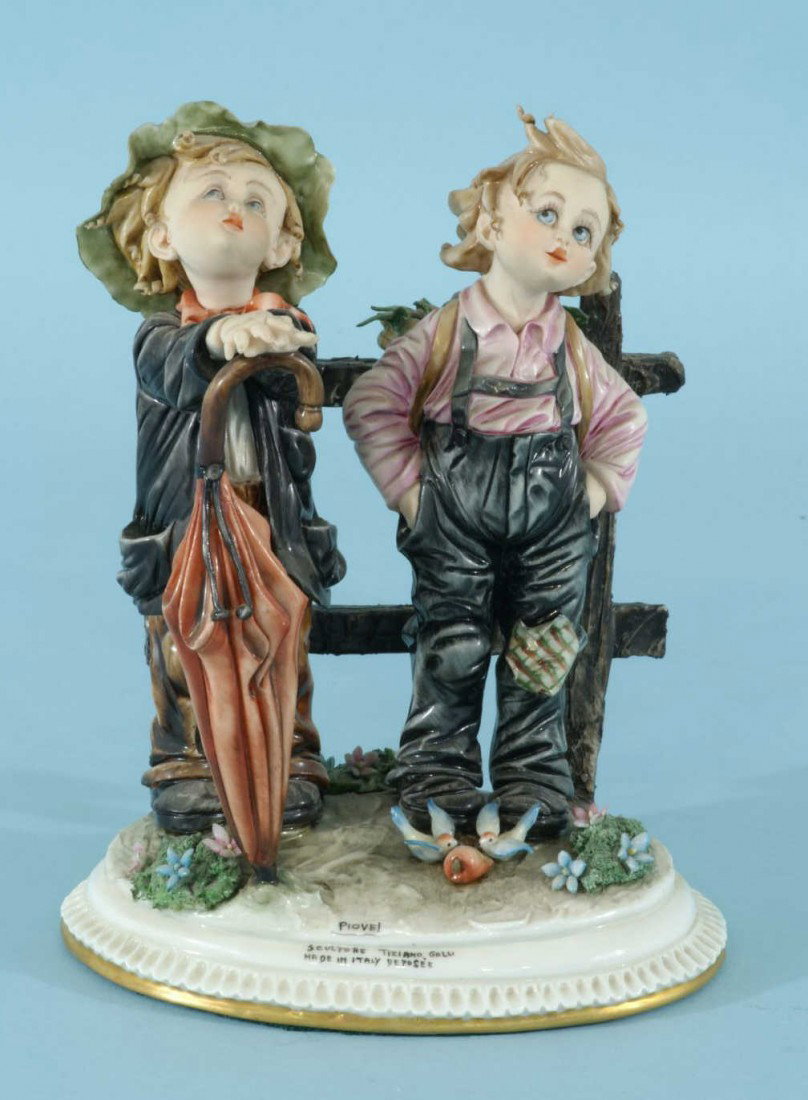 G. CAPPE "BOYS BY A FENCE" FIGURE TIZIANO GALLI: G. CAPPE "BOYS BY A FENCE" FIGURE TIZIANO GALLI, ITALY. Height: 8 in. by Width: 6 in. by Depth: 4 in.