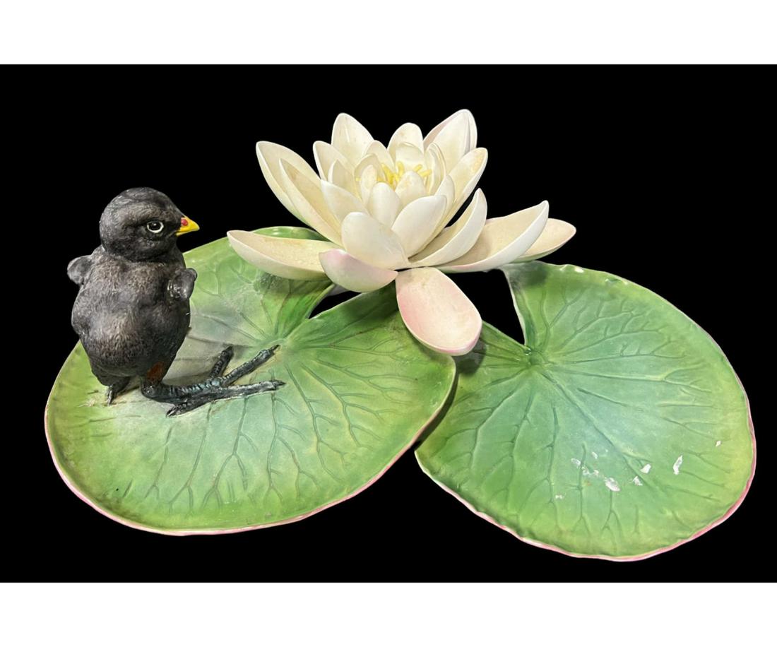 ROYAL WORCESTER MOORHEN CHICK GALLINULA & LILY: ROYAL WORCESTER MOORHEN CHICK GALLINULA AND WATER LILY. Height: 4 in. by Width: 12.5 in. by Depth: 10 in.