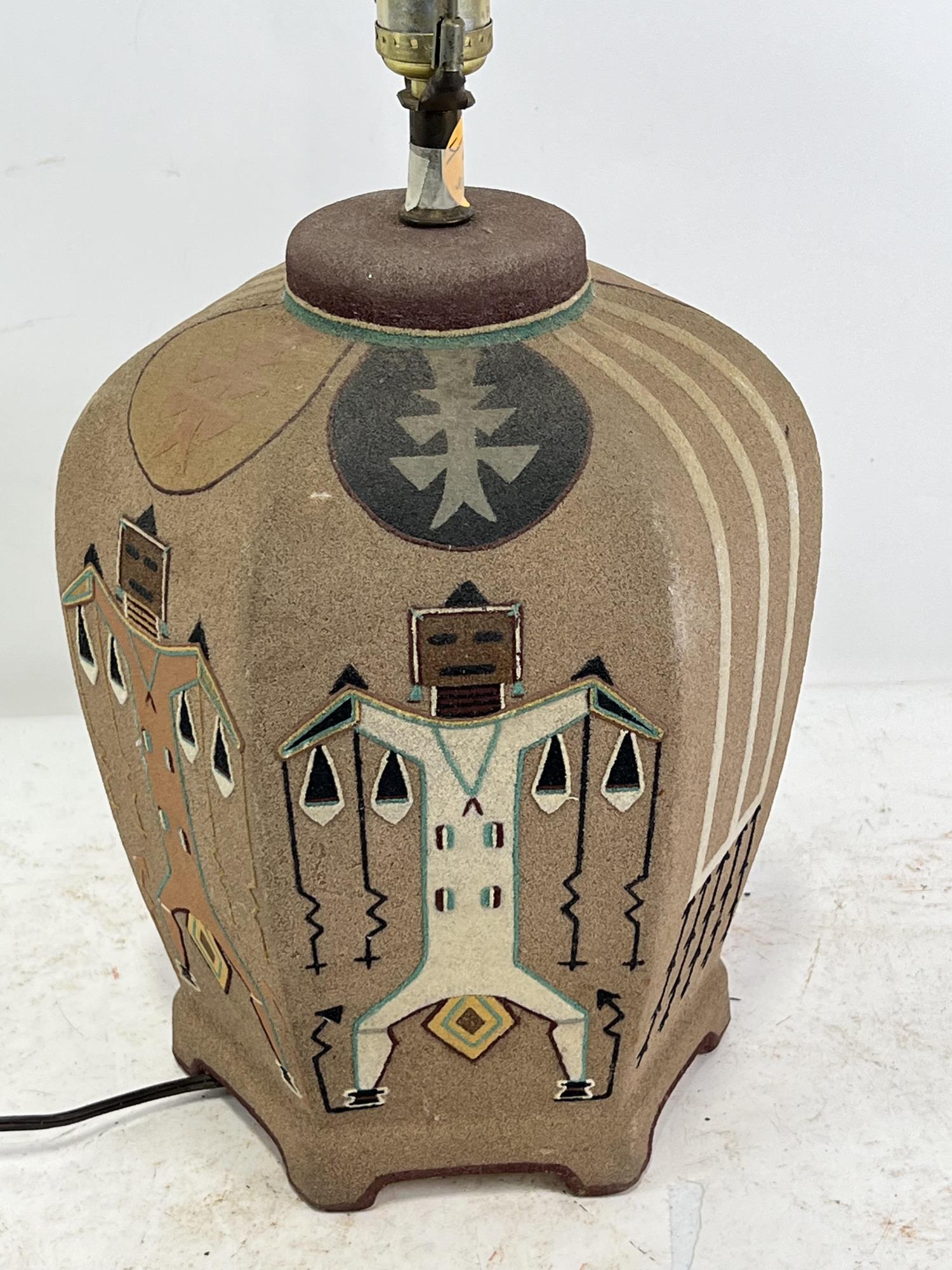 NATIVE AMERICAN MOTIF TABLE LAMP: NATIVE AMERICAN MOTIF TABLE LAMP Height: 26 in. by Width: 10 in. by Depth: 10 in.