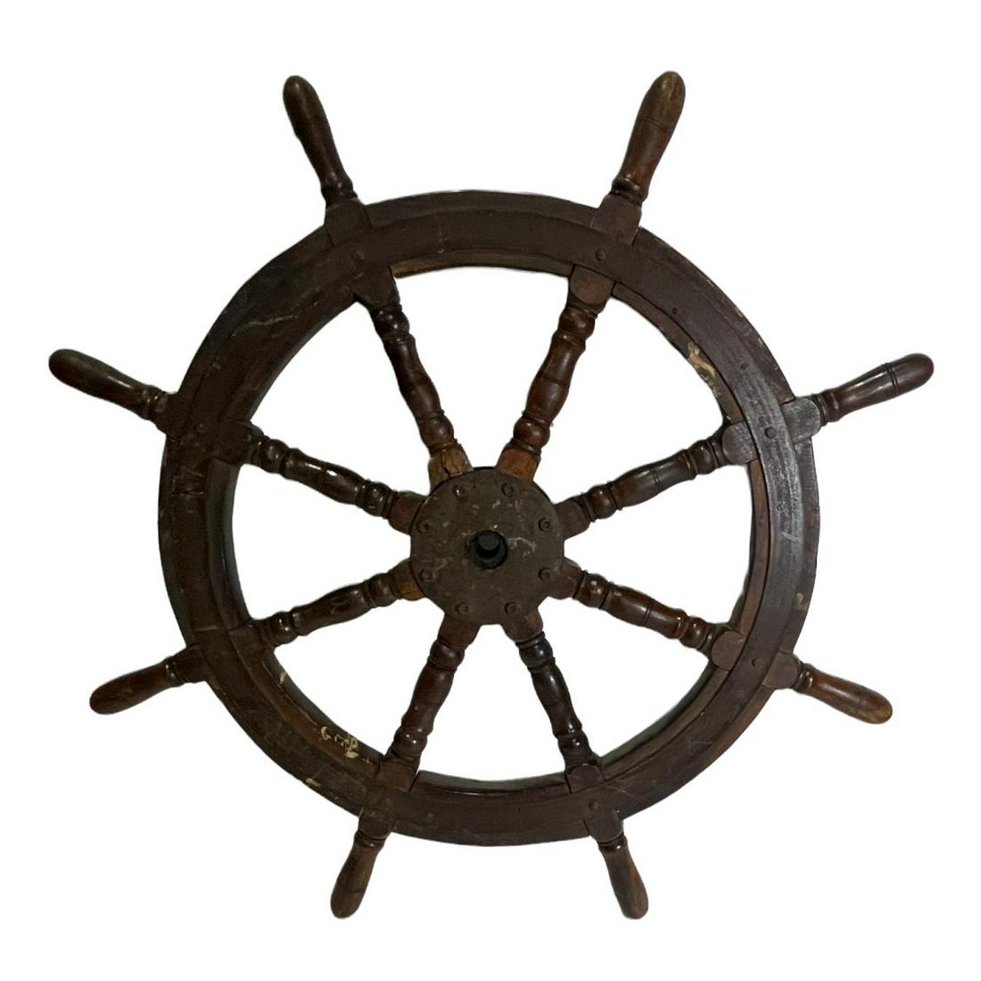 ANTIQUE WOODEN SHIP'S STEERING WHEEL: ANTIQUE WOODEN SHIP'S STEERING WHEEL. Height: 44 in. by Width: 44 in. by Depth: 44 in.