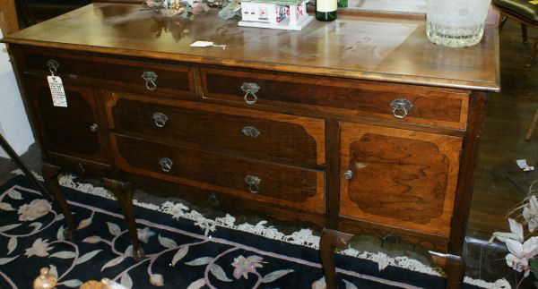English sideboard with mirrored backsplash: English sideboard with mirrored backsplash. Buyer's Responsibility: All items must be paid the day of purchase and removed from the premises no later than 5 p.m. Monday, June 27. Or items may be picke