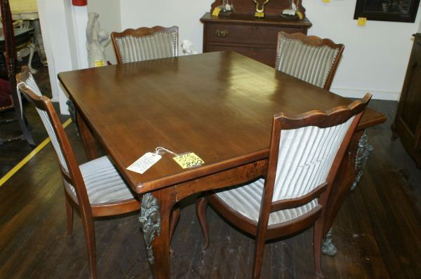 French table & 4 chairs: French table & 4 chairs. Buyer's Responsibility: All items must be paid the day of purchase and removed from the premises no later than 5 p.m. Monday, June 27. Or items may be picked up Saturday, July