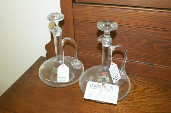 Pair Hartzviller decanters: Pair Hartzviller decanters. Buyer's Responsibility: All items must be paid the day of purchase and removed from the premises no later than 5 p.m. Monday, June 27. Or items may be picked up Saturday, J