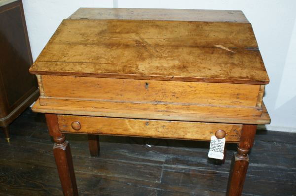 19th Century pine planter's desk: 19th Century pine planter's desk. Buyer's Responsibility: All items must be paid the day of purchase and removed from the premises no later than 5 p.m. Monday, June 27. Or items may be picked up Satur