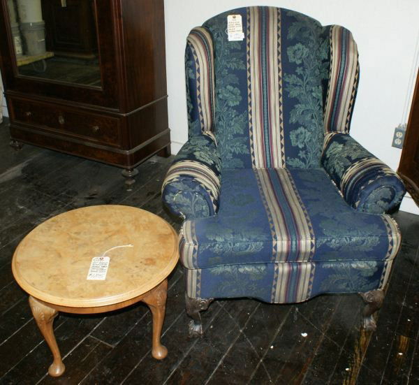 Ball & claw wing chair and burl walnut side table: Ball & claw wing chair and burl walnut side table. Buyer's Responsibility: All items must be paid the day of purchase and removed from the premises no later than 5 p.m. Monday, June 27. Or items may b