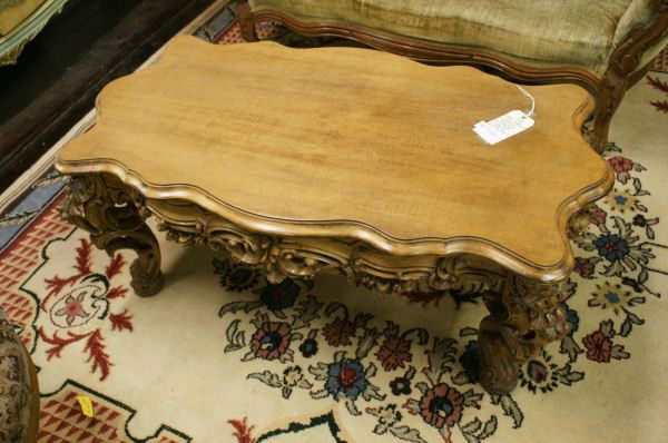 Carved Wood Coffee Table: Carved Wood Coffee Table. Buyer's Responsibility: All items must be paid the day of purchase and removed from the premises no later than 5 p.m. Monday, June 27. Or items may be picked up Saturday, Jul