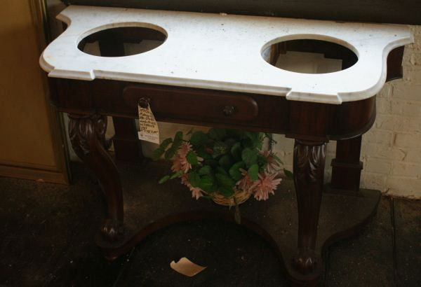 French Mahogany Double Basin Marble Top Washstand: French Mahogany Double Basin Marble Top Washstand ( Basin Missing). Buyer's Responsibility: All items must be paid the day of purchase and removed from the premises no later than 5 p.m. Monday, June 2
