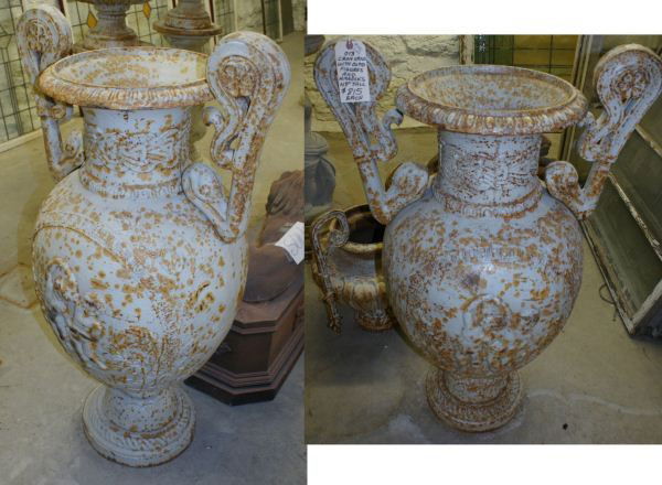 Monumental Pair of Cast Iron Urns Painted White: Monumental Pair of Cast Iron Urns Painted White. Buyer's Responsibility: All items must be paid the day of purchase and removed from the premises no later than 5 p.m. Monday, June 27. Or items may be
