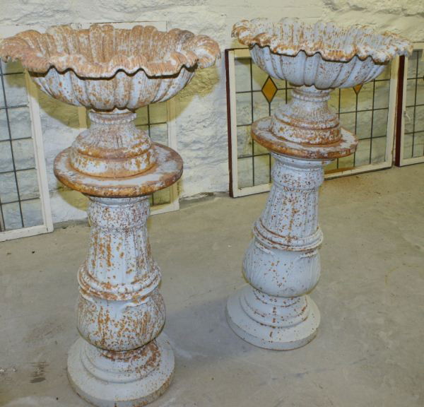 Pair of Cast Iron Planters & Pedestals: Pair of Cast Iron Planters & Pedestals. Buyer's Responsibility: All items must be paid the day of purchase and removed from the premises no later than 5 p.m. Monday, June 27. Or items may be picked up